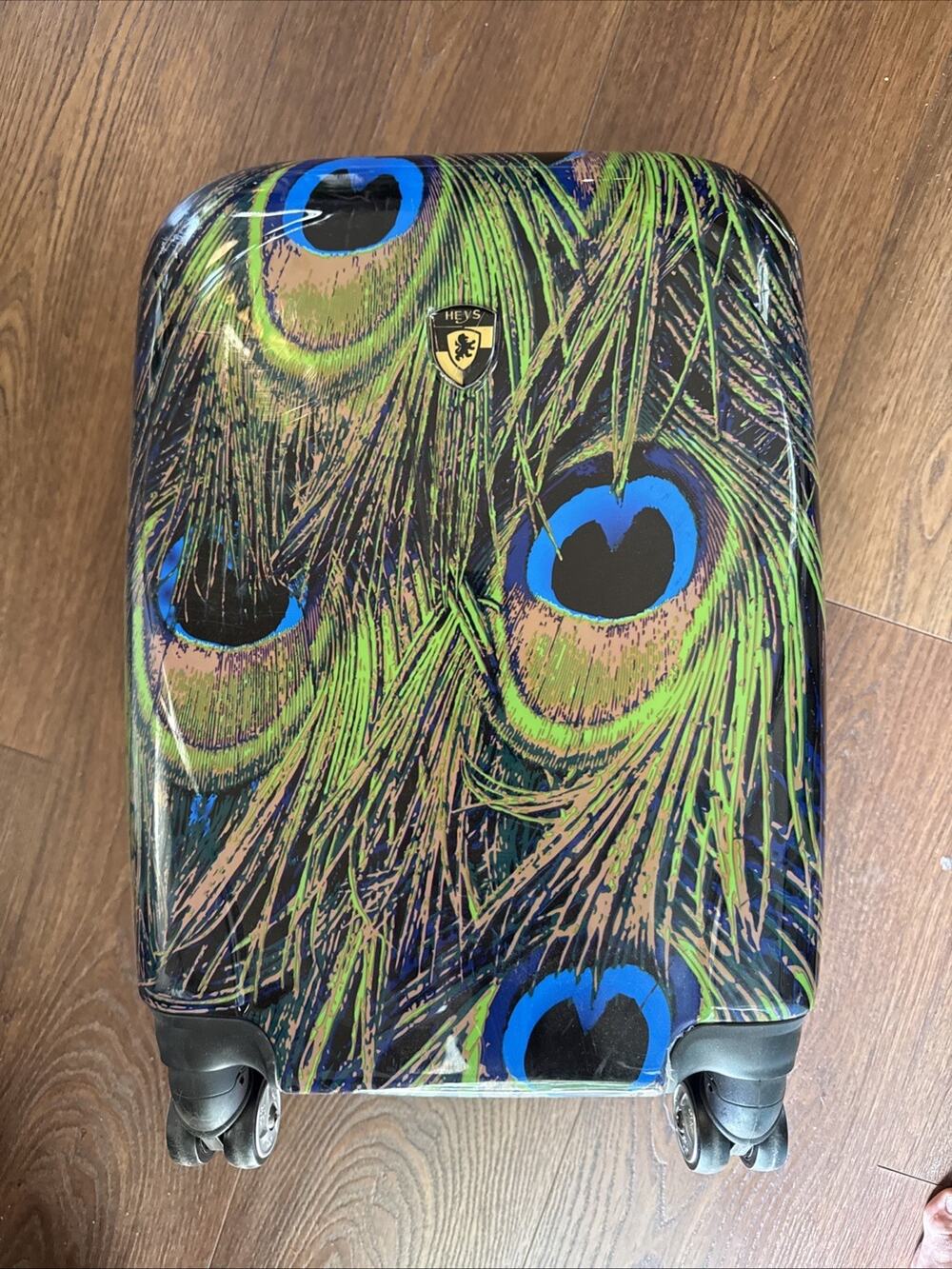 Heys Astro 21" Spinner Suitcase Luggage Peacock